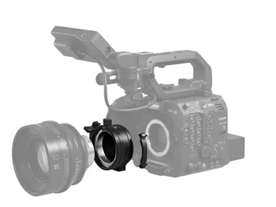 Adapter between a camera and lens
